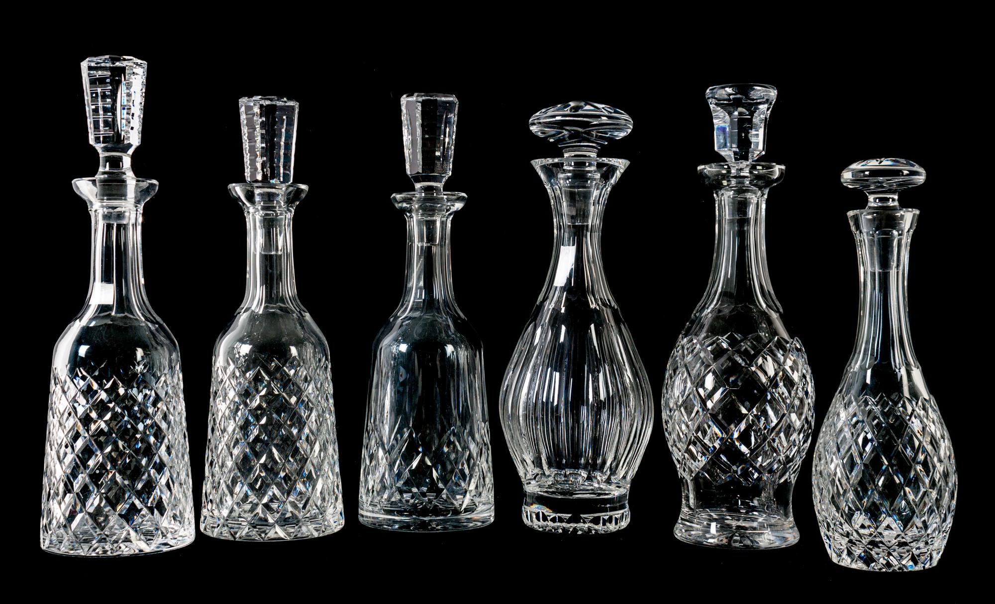A Group of Six Waterford Glass Decanters Height of tallest 13 1/4 inches. — 20TH CENTURY