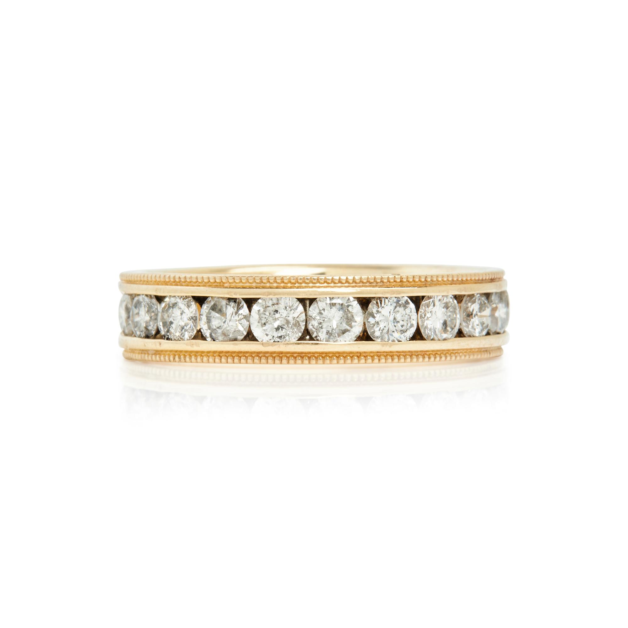 YELLOW GOLD AND DIAMOND BAND RING