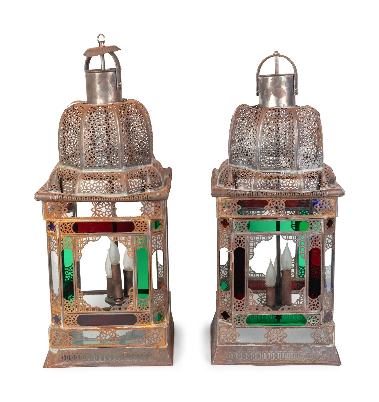 A Pair of Middle Eastern Stamped Metal and Colored Glass Lanterns — 20TH CENTURY