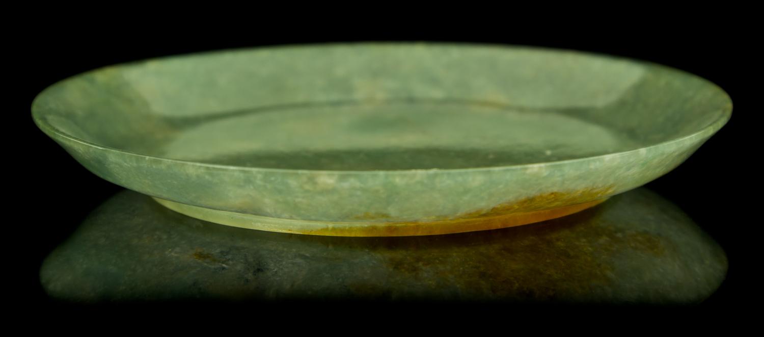 A Green Jade Circular Dish Diameter 4 1/8 inches.