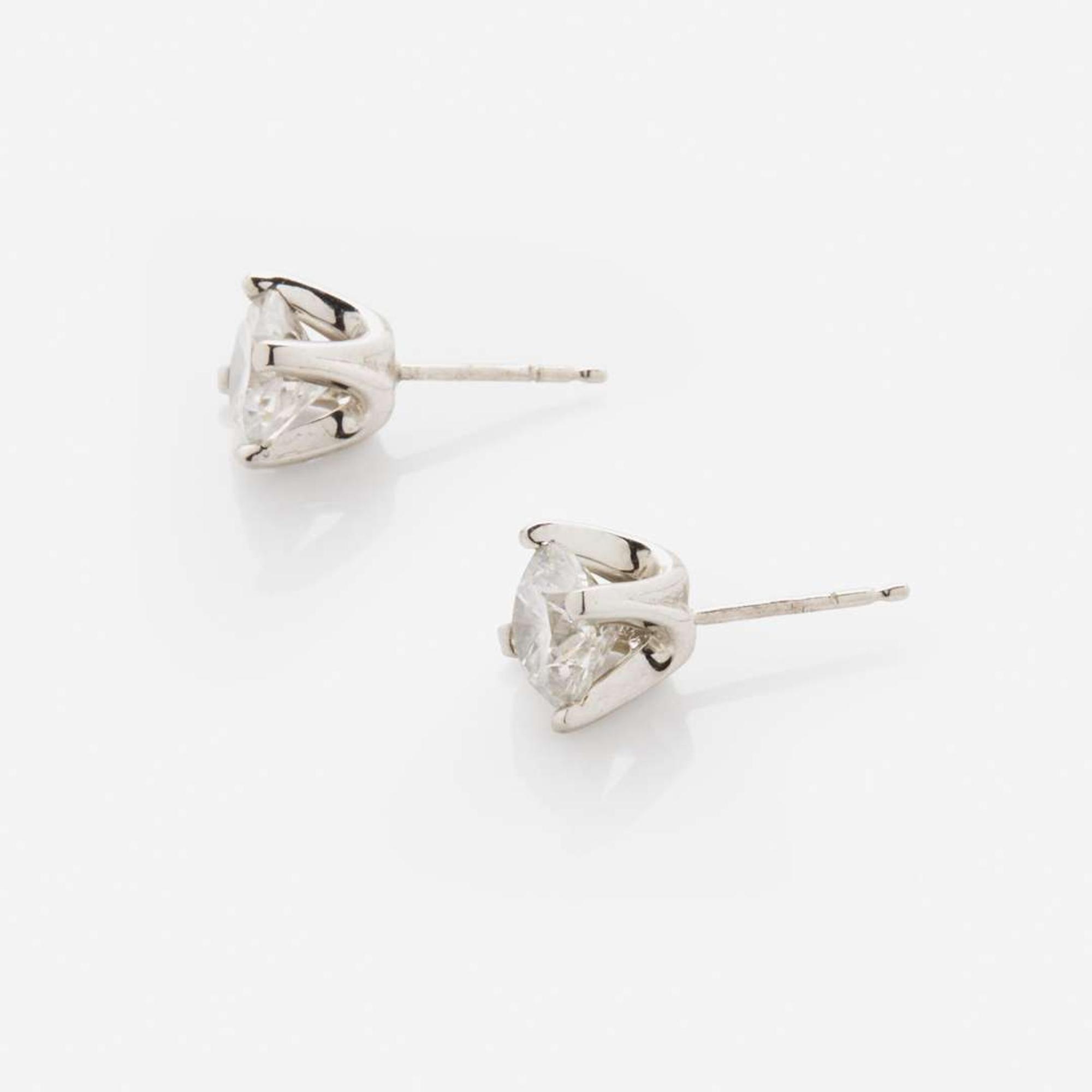 A Pair of 14K White Gold and Diamond Stud Earrings