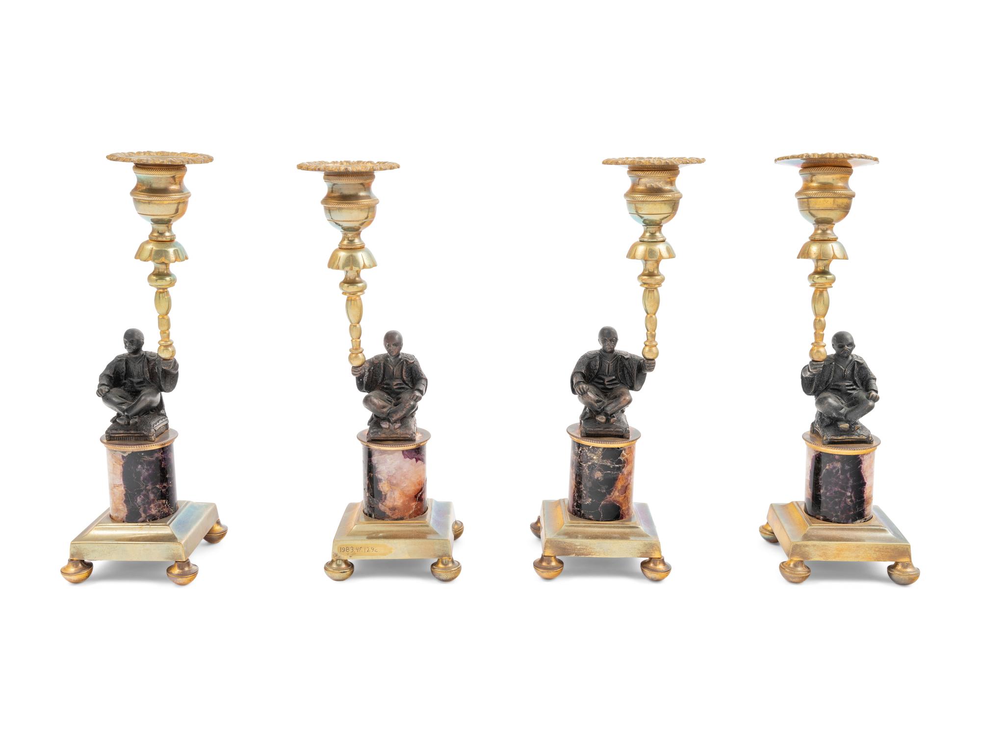 A Set of Four Gilt Metal and 'Blue John' Figural Candlesticks