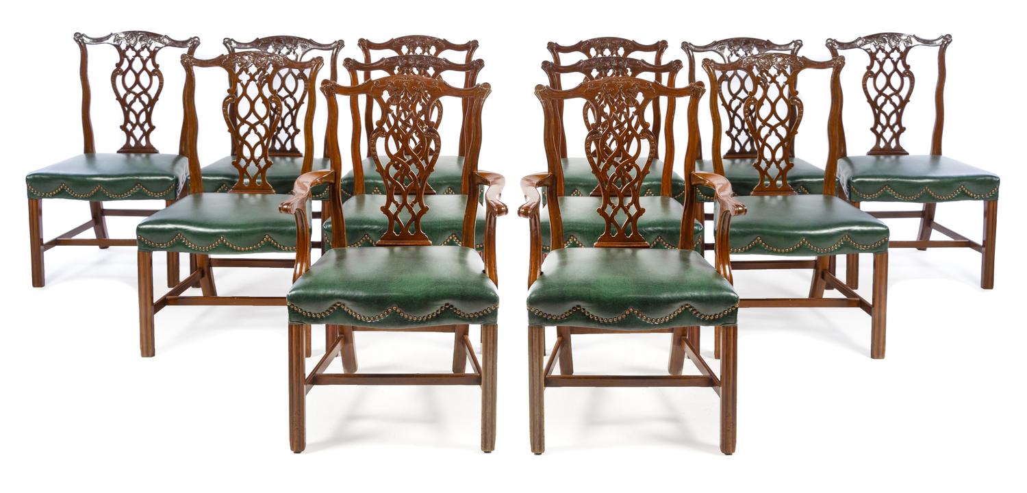 A Set of Twelve Chippendale Style Mahogany Dining Chairs Height 38 1/2 inches. — 20TH CENTURY