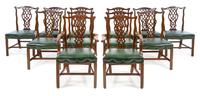 A Set of Twelve Chippendale Style Mahogany Dining Chairs Height 38 1/2 inches. — 20TH CENTURY