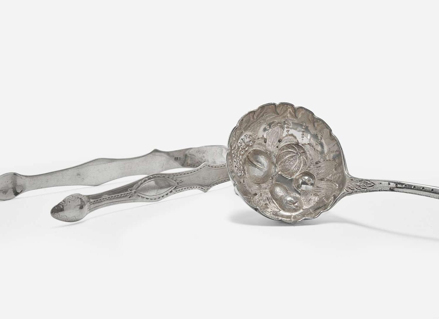 An assorted group of nine George III and Victorian sterling silver tablewares, various makers, various dates ranging 1748-1854