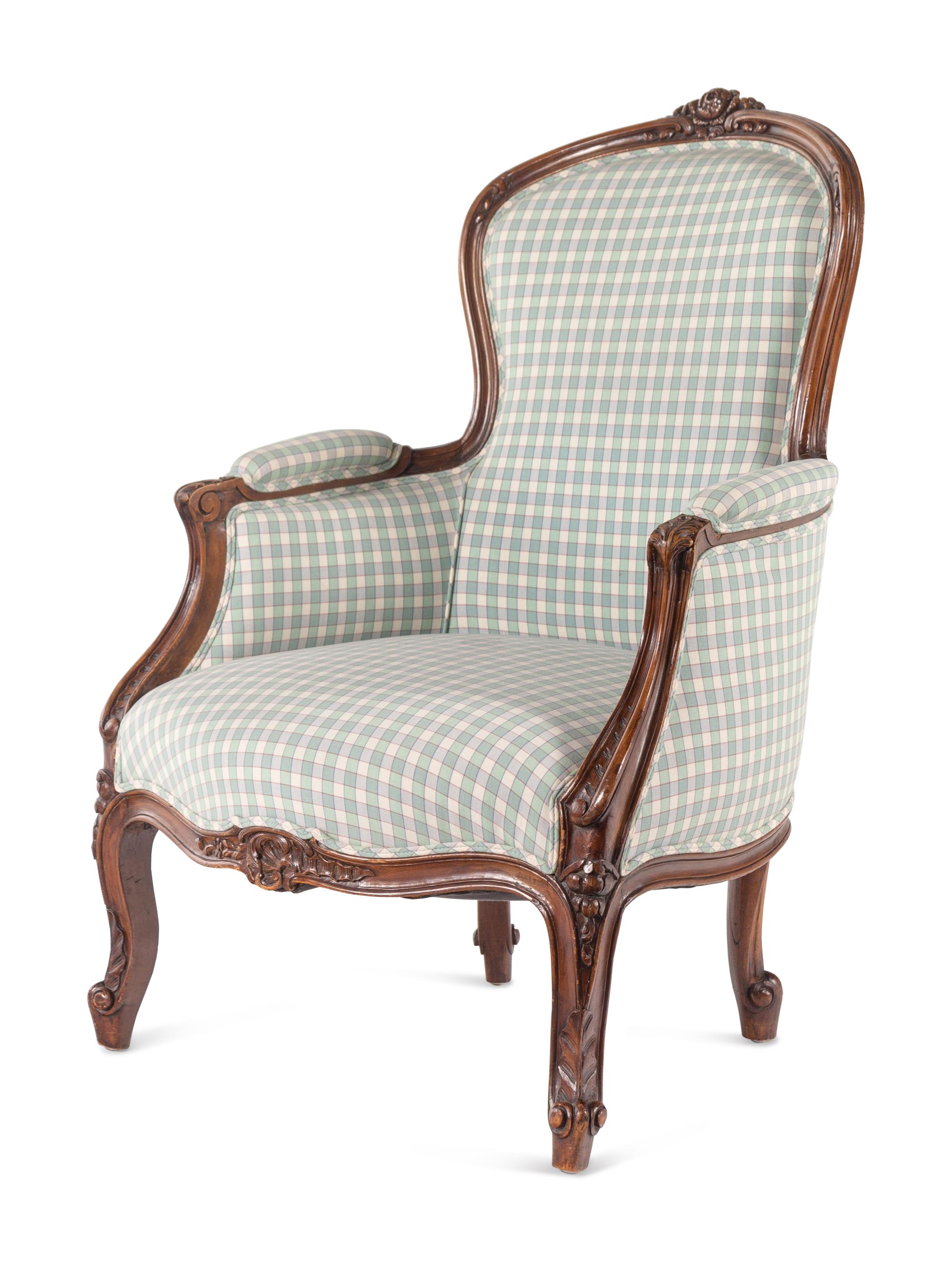 A Louis XV Style Walnut Bergère en Cabriolet