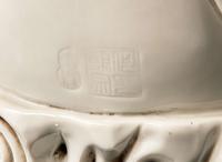 A Chinese Dehua blanc de chine figure of seated Guanyin 德化窯觀音坐像