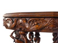 An Italian Carved Walnut and Marquetry Table