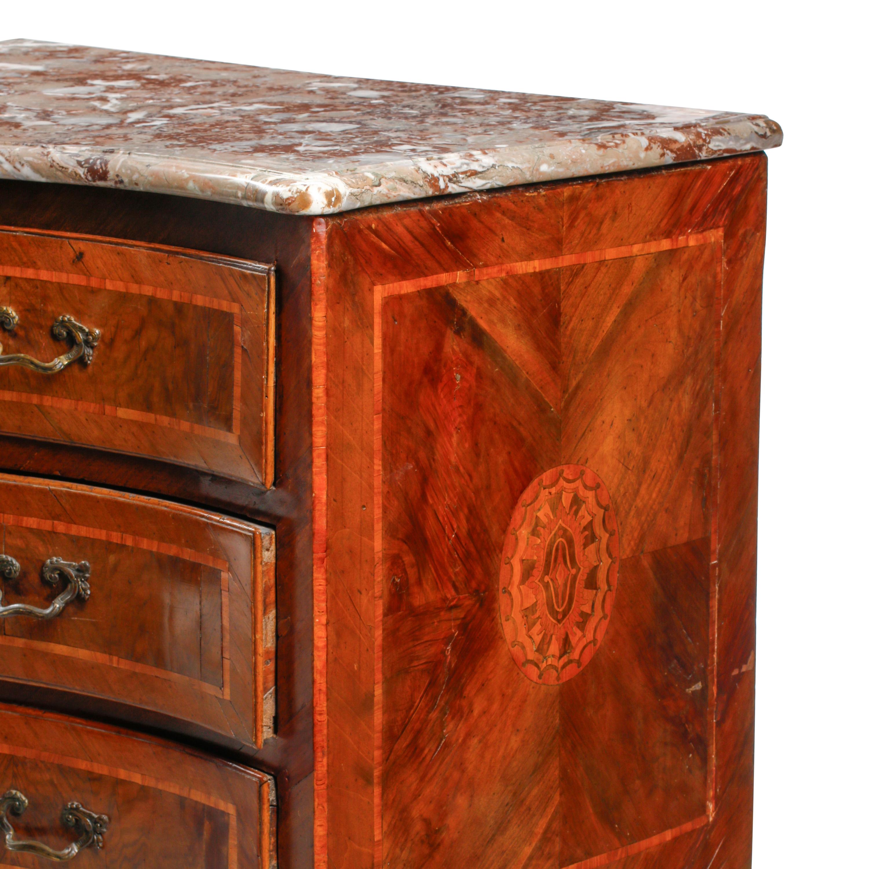 An Italian Walnut and Marquetry Marble-Top Commode