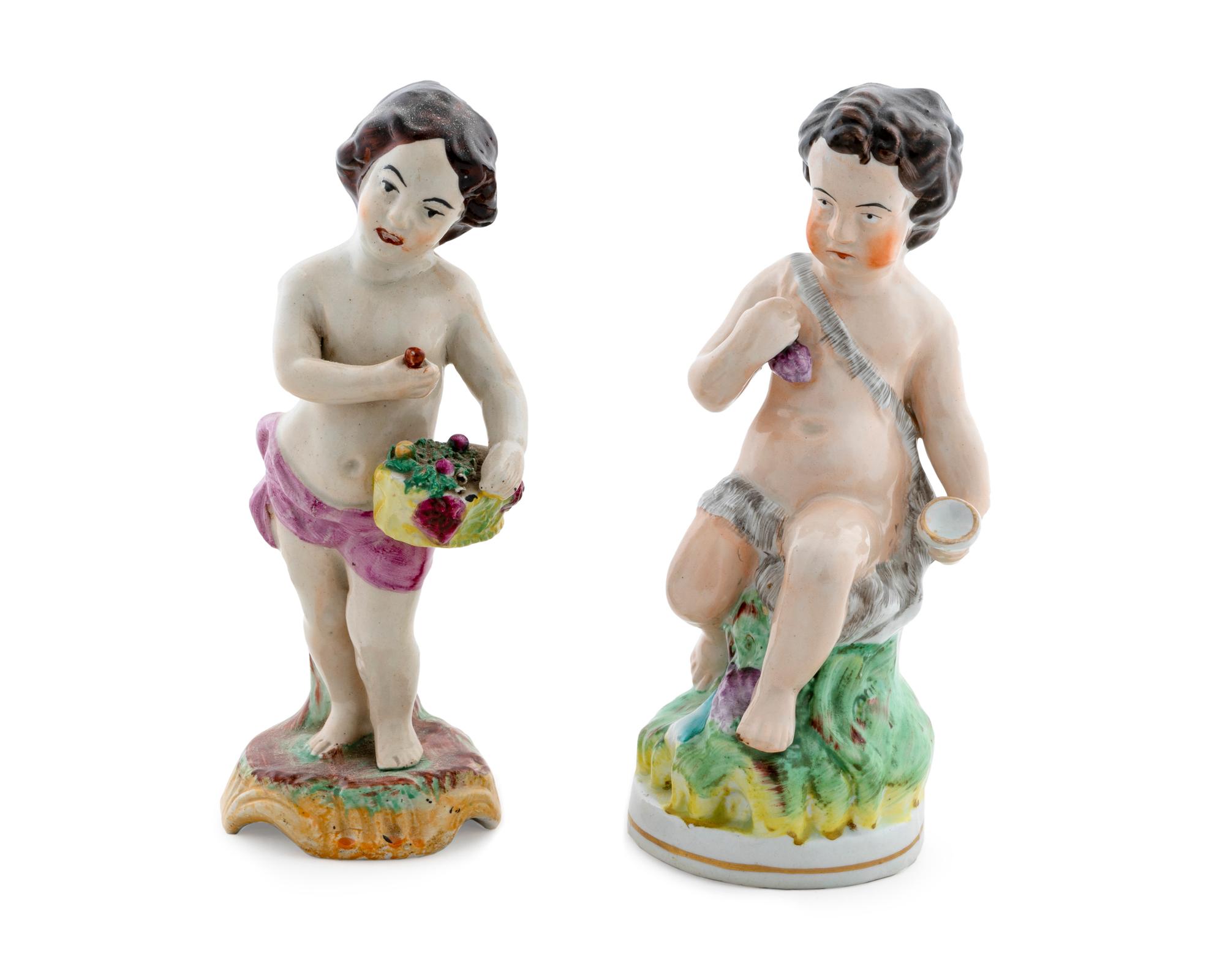 Two Staffordshire Figures of Putti — 19TH CENTURY
