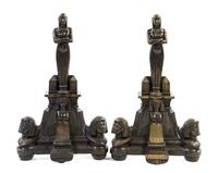A Pair of Egyptian Revival Bronze Andirons, Height 39 inches.