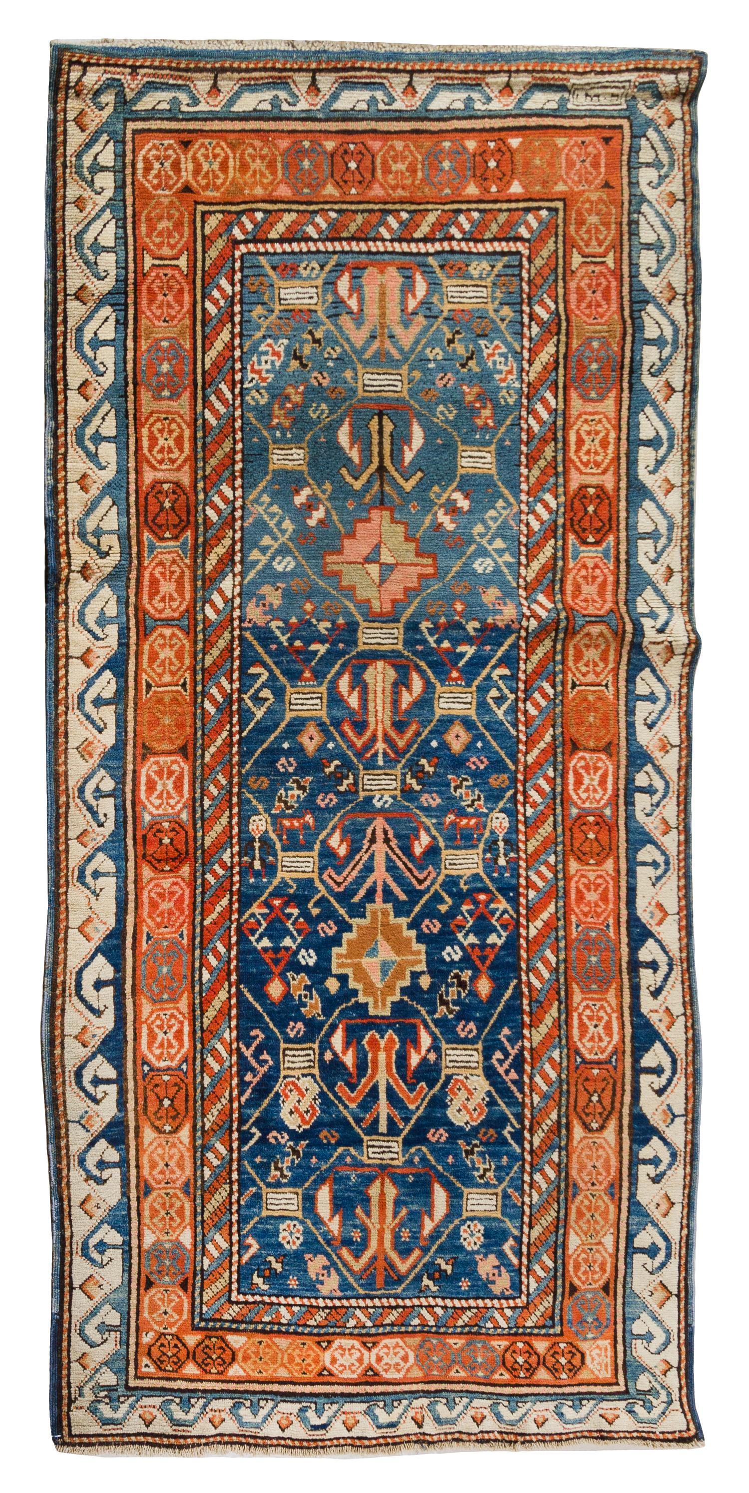 A Caucasian Wool Rug 5 feet 10 inches x 3 feet 1 inch. — EARLY 20TH CENTURY