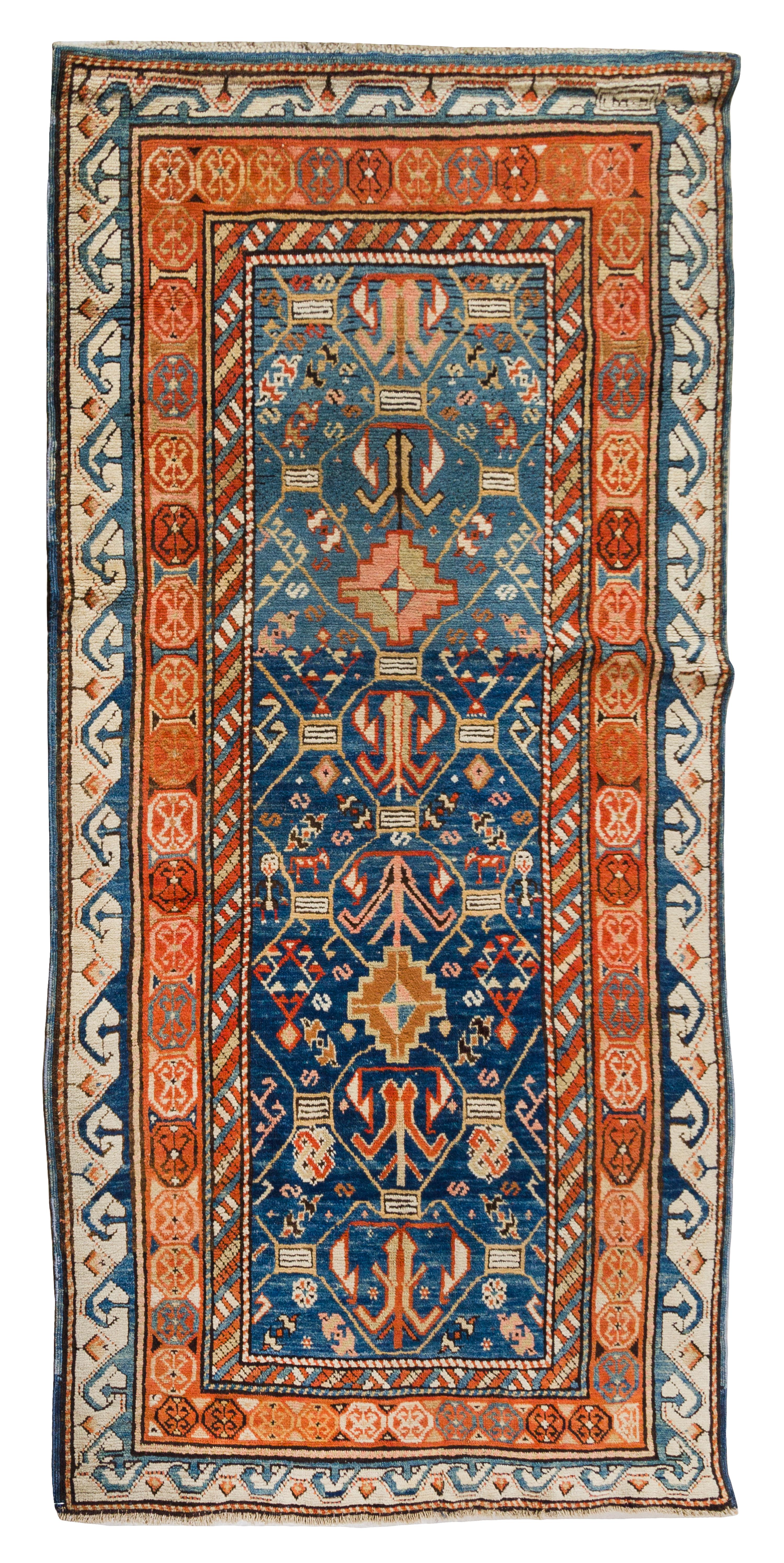 A Caucasian Wool Rug 5 feet 10 inches x 3 feet 1 inch. — EARLY 20TH CENTURY