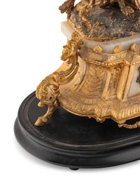A French Gilt Metal and Alabaster Mantel Clock