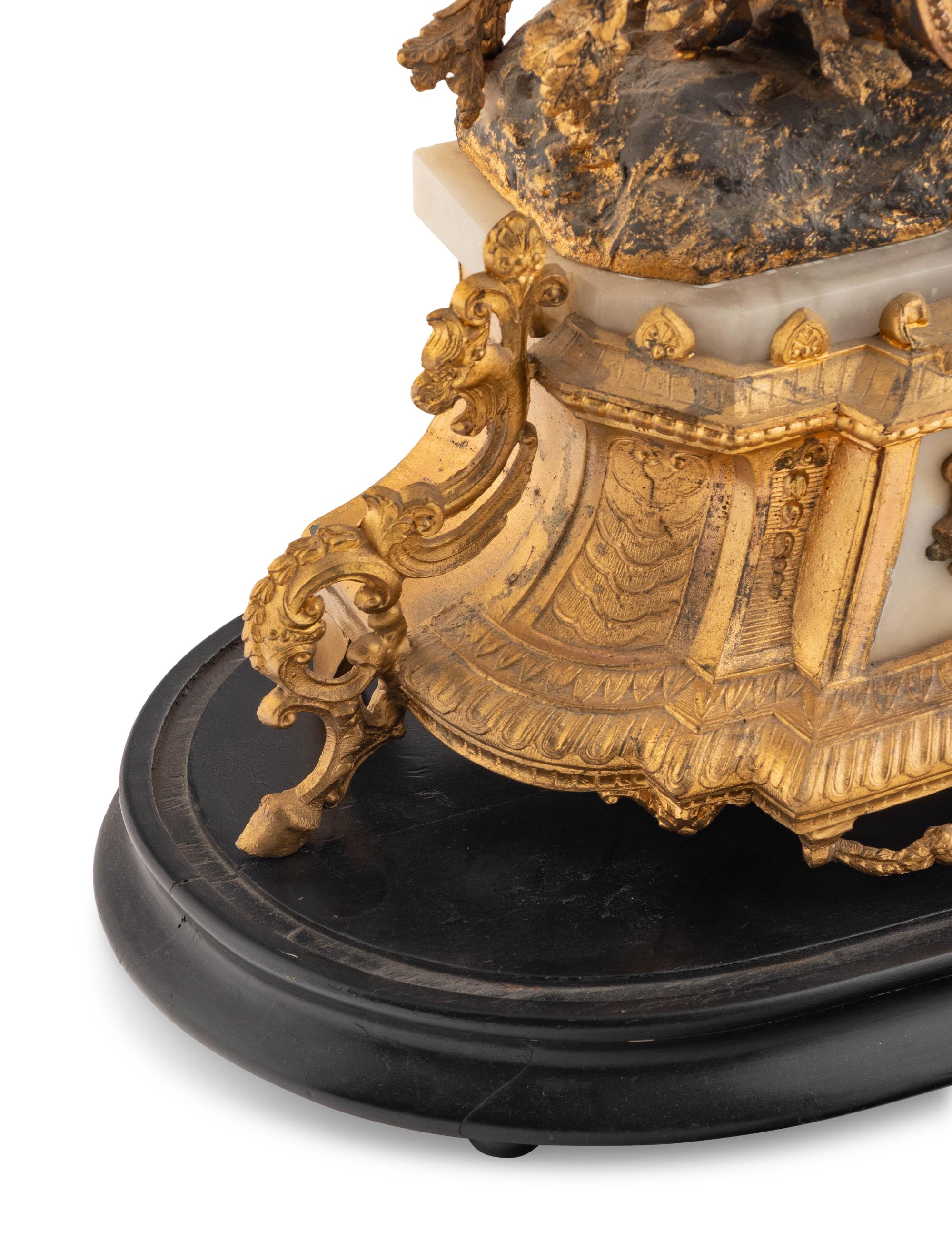 A French Gilt Metal and Alabaster Mantel Clock