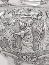 A George III Silver Chinoiserie Decorated Kettle