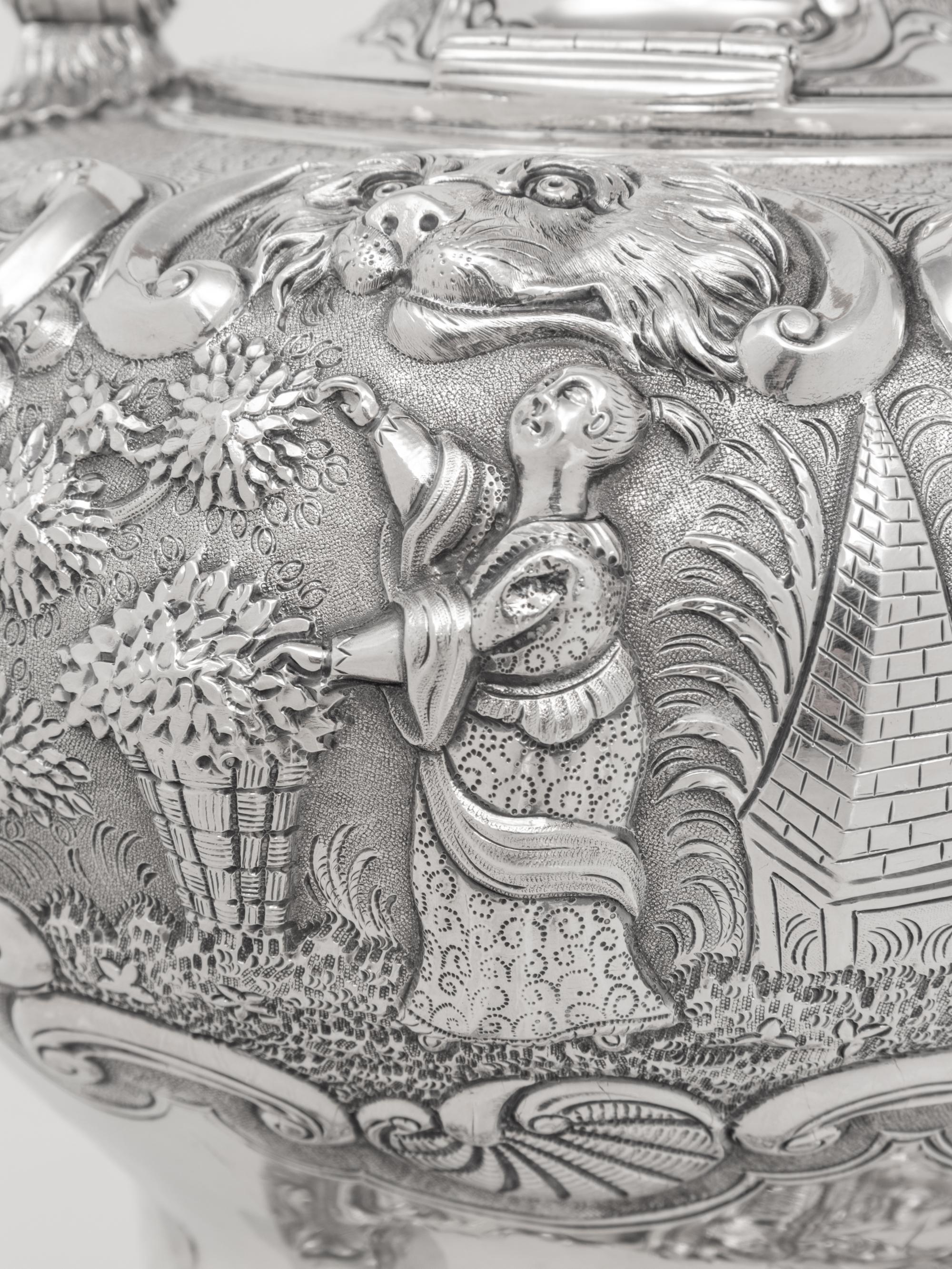 A George III Silver Chinoiserie Decorated Kettle