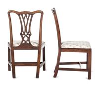 A Matched Set of Four Chippendale Walnut Side Chairs