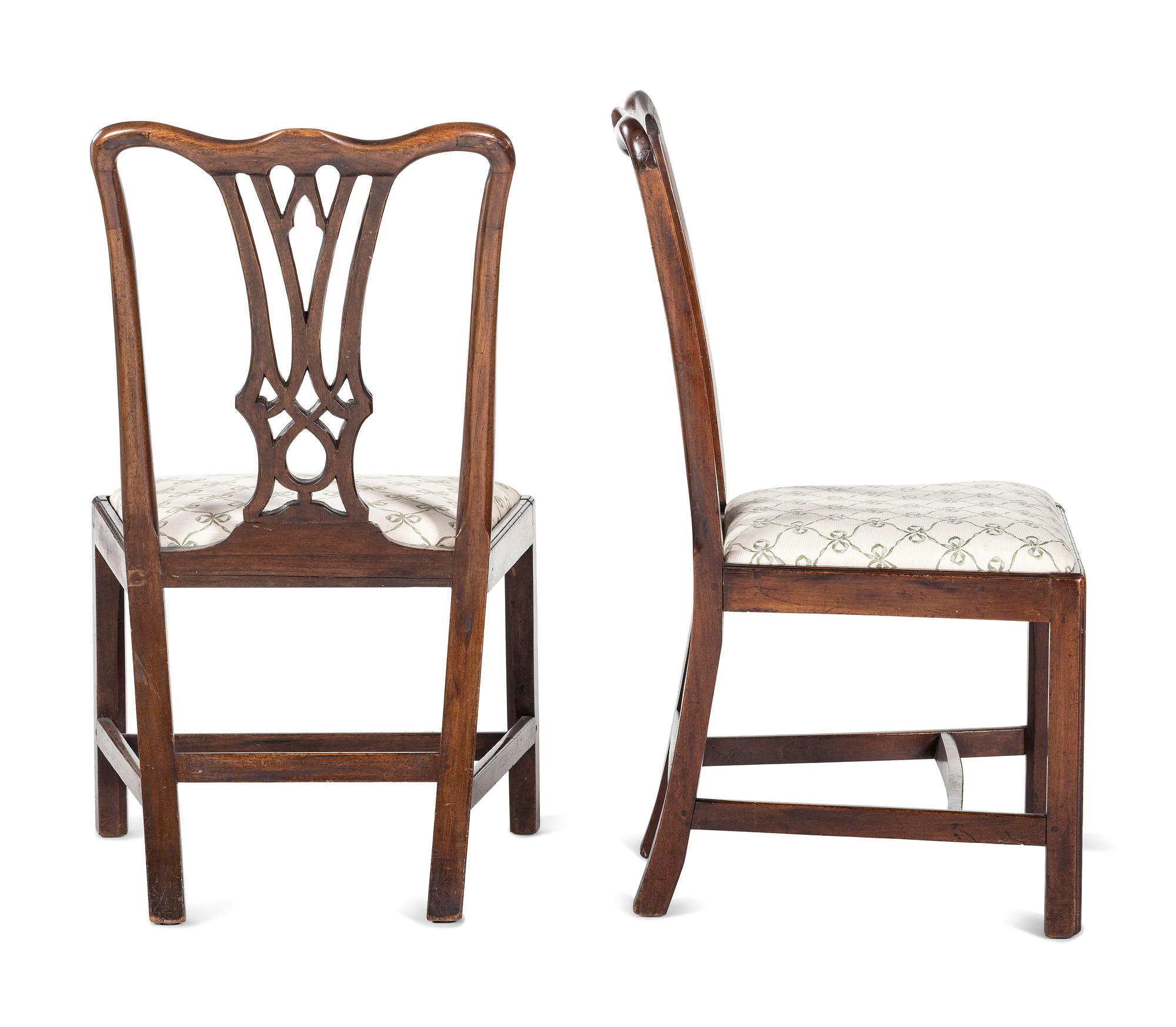A Matched Set of Four Chippendale Walnut Side Chairs