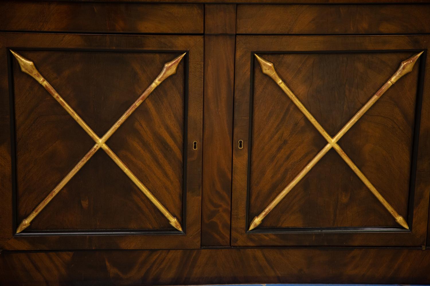 A Empire Style Mahogany and Parcel Gilt Bookcase