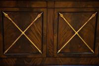 A Empire Style Mahogany and Parcel Gilt Bookcase