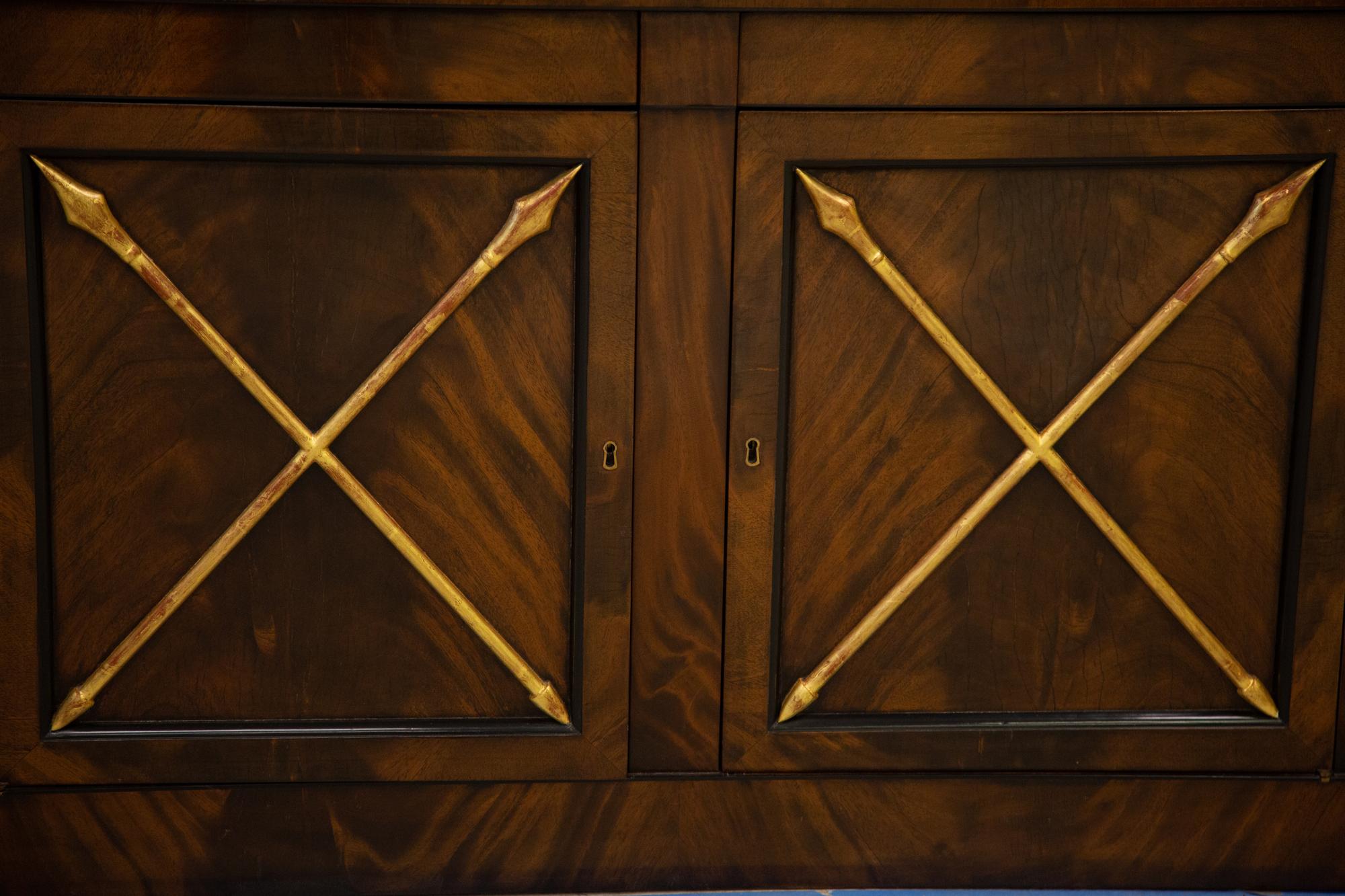 A Empire Style Mahogany and Parcel Gilt Bookcase