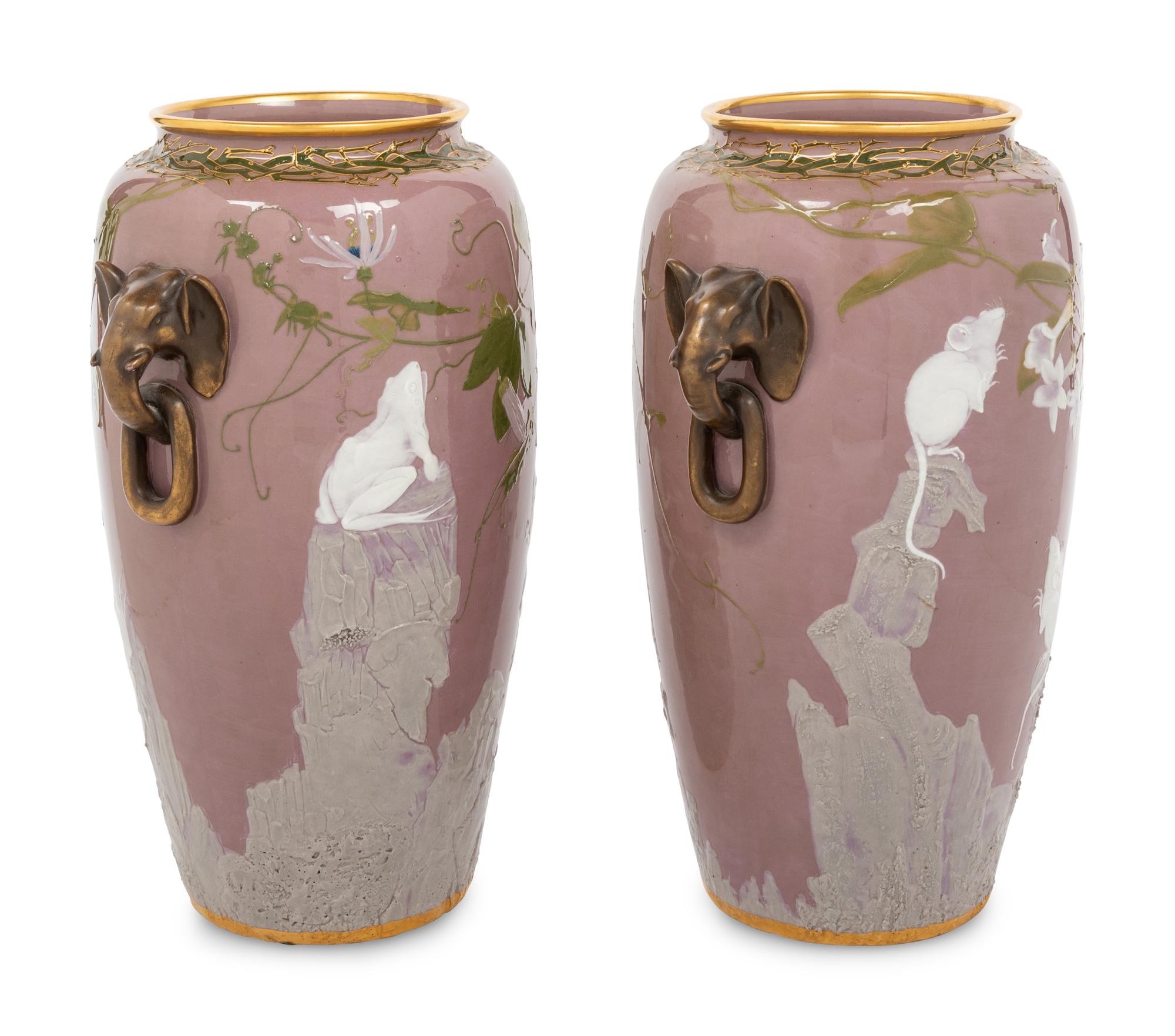 A Pair of Mintons Pate-sur-Pate Elephant Handle Urns