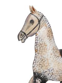 A Paint Decorated Rocking Horse and a Carved Rocking Horse