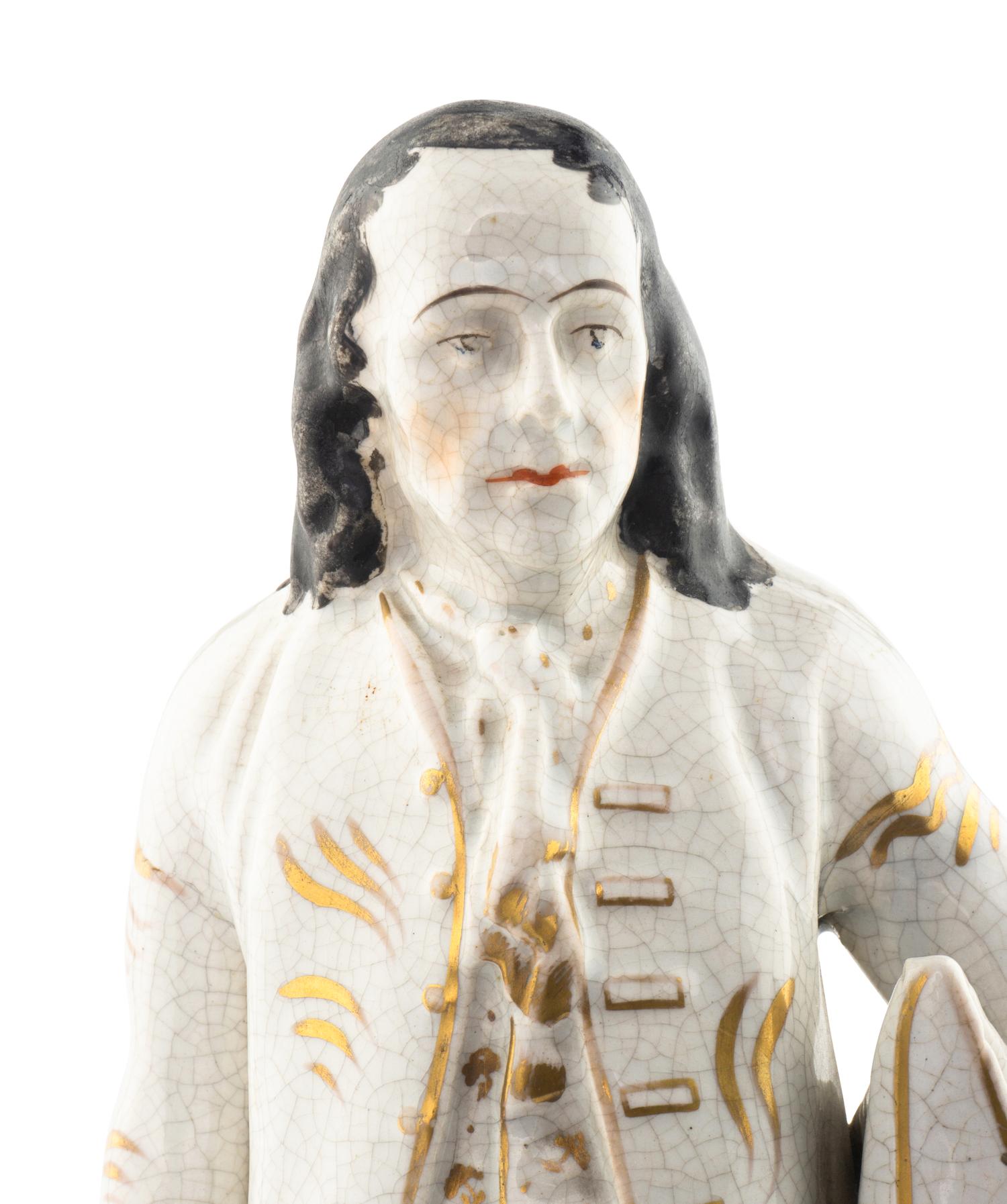A Staffordshire Ceramic Figure of Benjamin Franklin