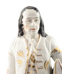 A Staffordshire Ceramic Figure of Benjamin Franklin