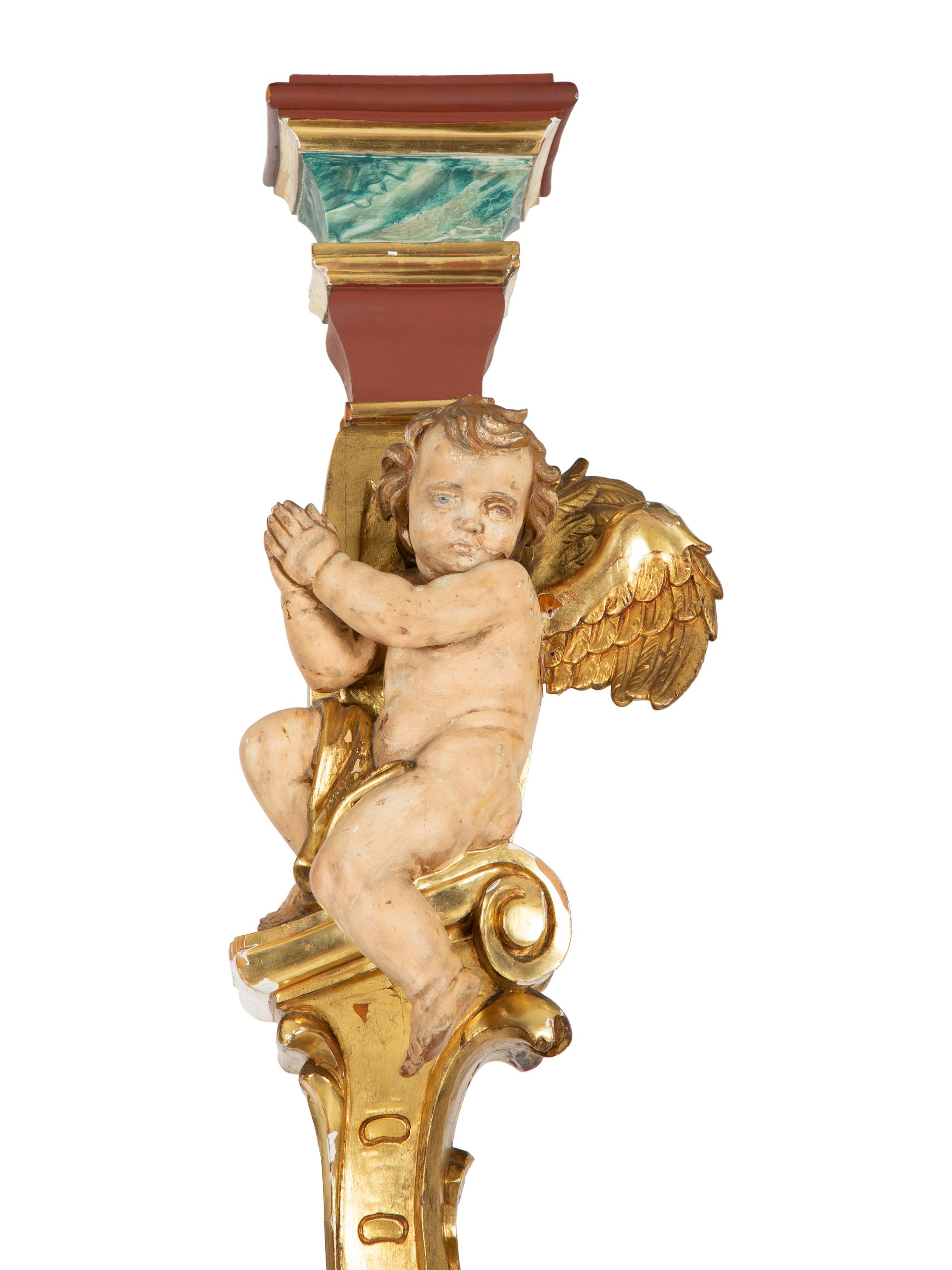 A Pair of Venetian Painted and Parcel Gilt Columns with Putti