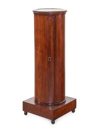 A Continental Mahogany Pedestal Cabinet