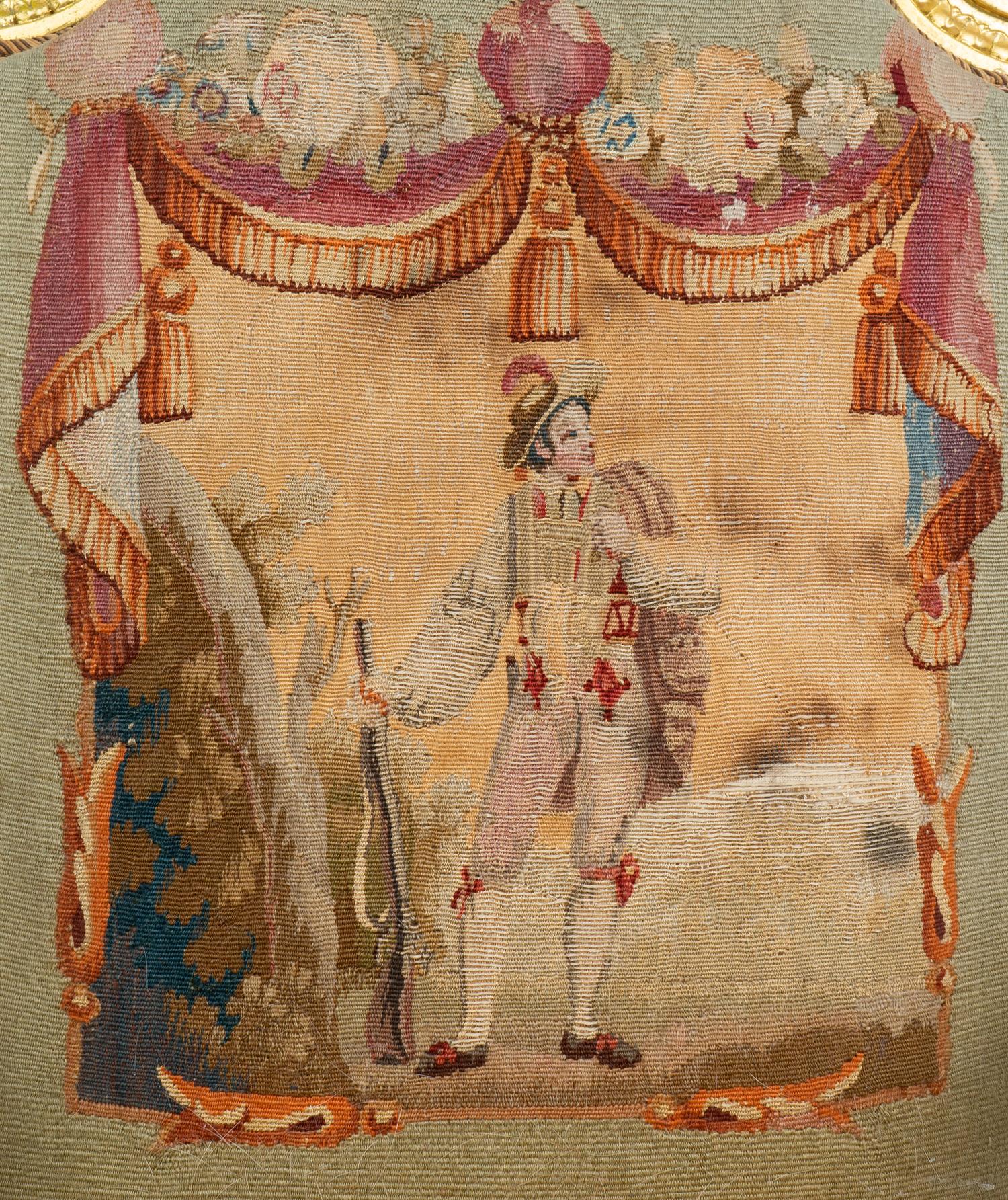 A Set of Four Louis XVI Style Giltwood Fauteuils with Tapestry Upholstery — 19TH CENTURY