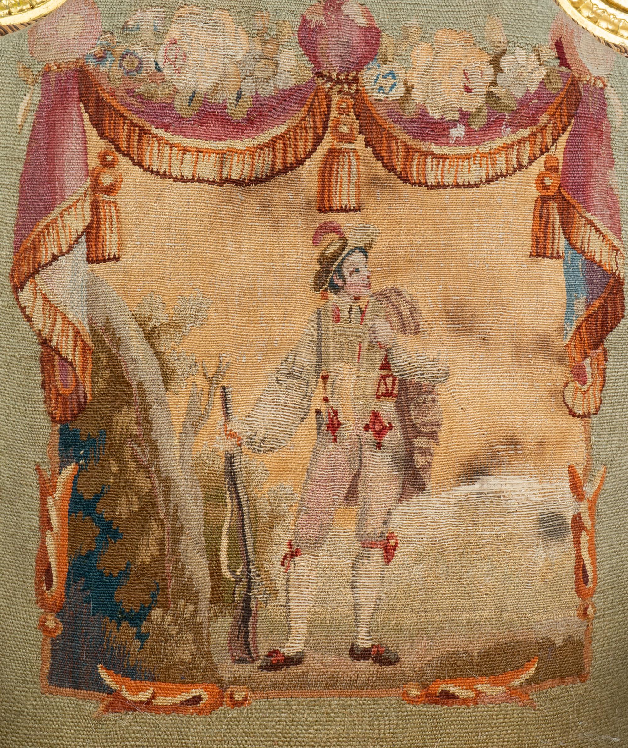 A Set of Four Louis XVI Style Giltwood Fauteuils with Tapestry Upholstery — 19TH CENTURY