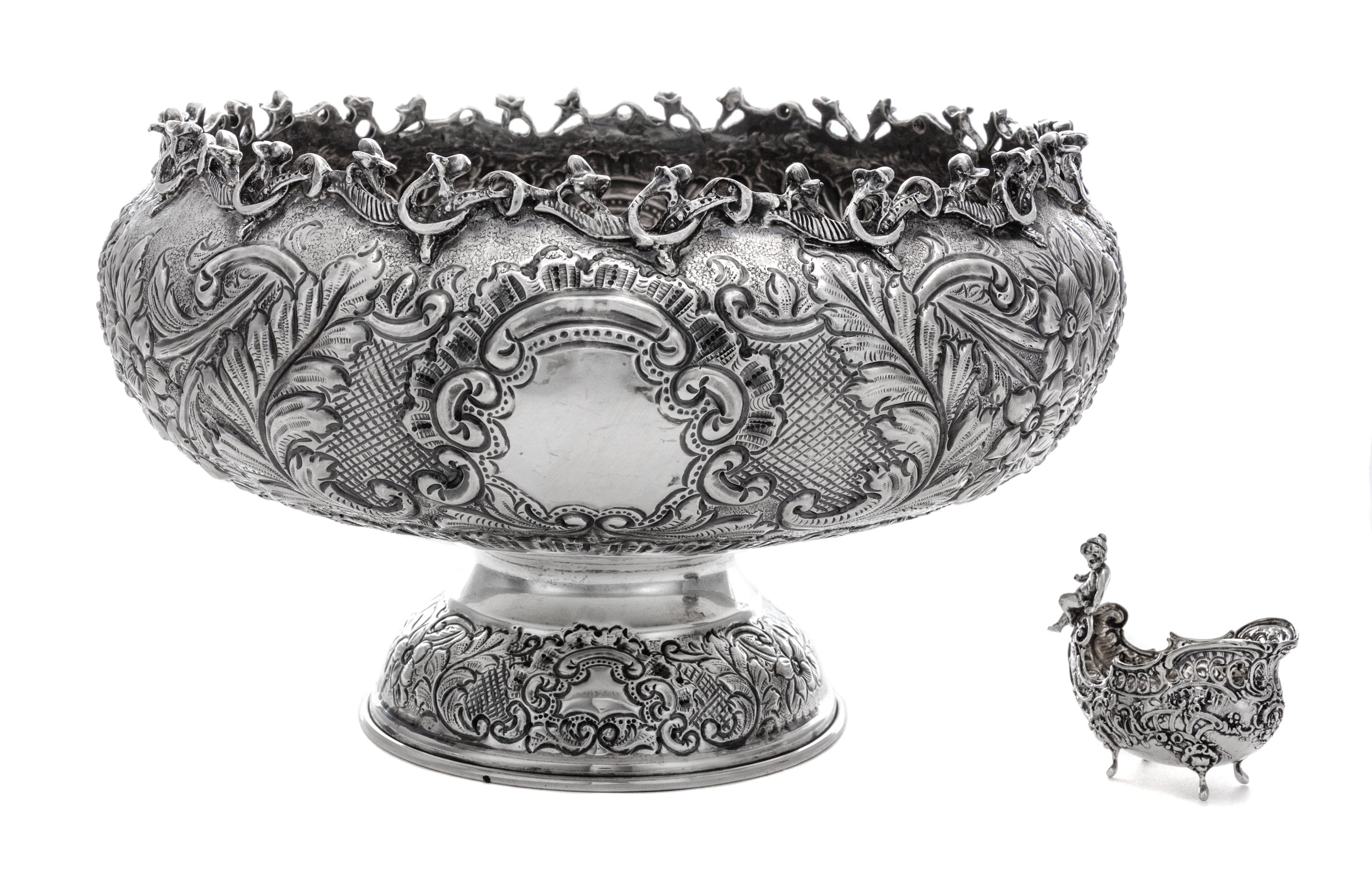 A German Silver Center Bowl, Maker's Mark Obscured, Late 19th/Early 20th Century, the body centered with C-scrolls enclosing a vacant c