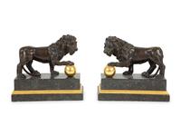 A Pair of Continental Patinated and Gilt Bronze Medici Lions