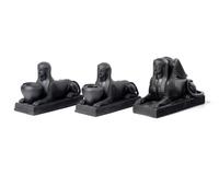 A Wedgwood Black Basalt Sphinx Figure and Two Related Inkwells