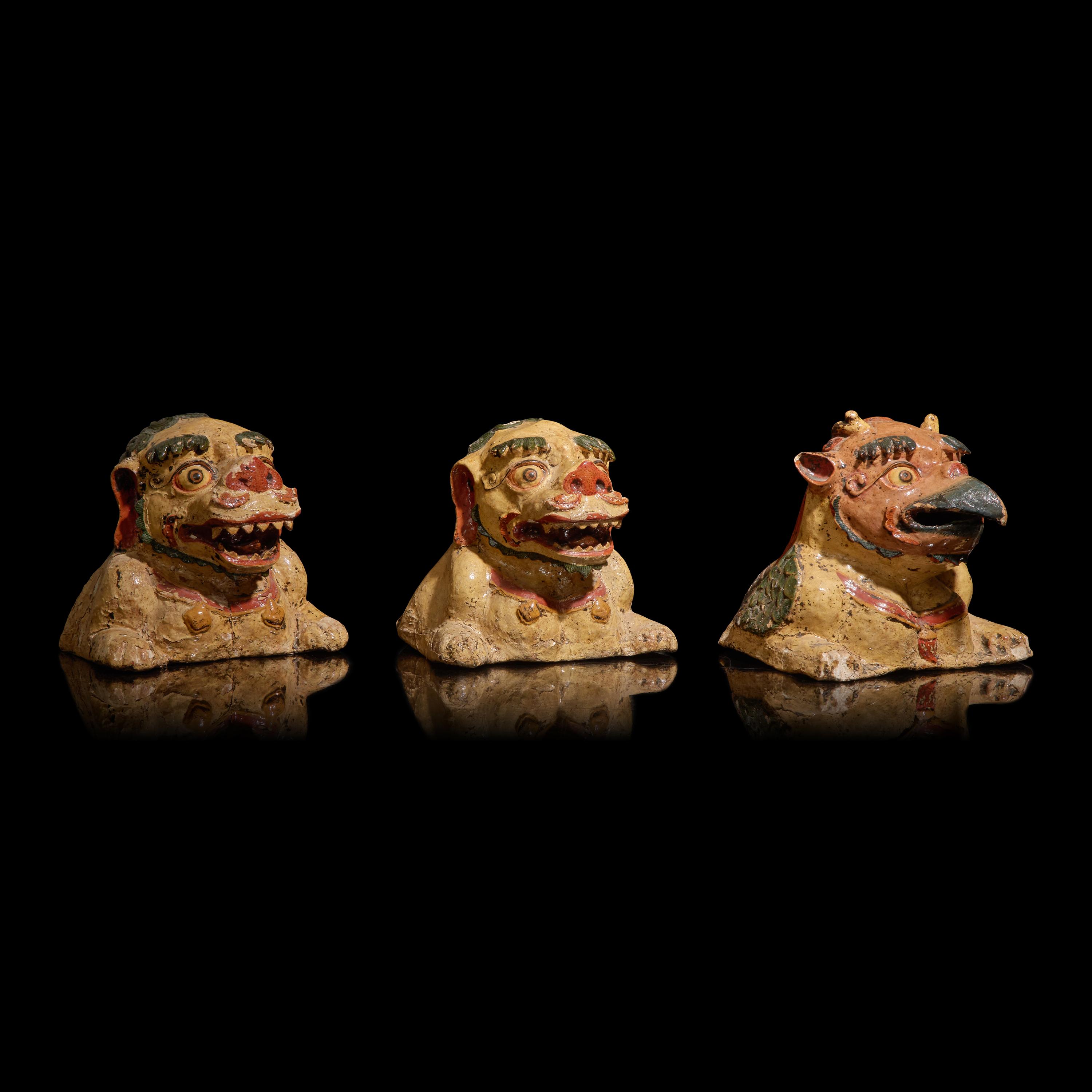 A Set of Three Polychrome Paper Mache Animal Head-Form Temple Architectural Elements, 15th Century — 十五世纪 纸浆夹纻彩绘寺院佛殿护雪狮及大鹏鸟一对
