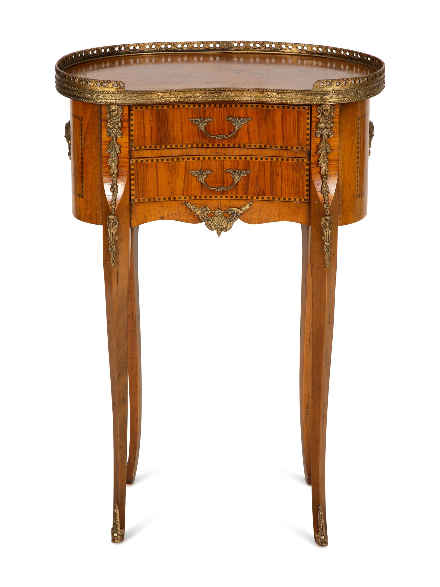 A Louis XV/XVI Transitional Style Gilt Metal Mounted Fruitwood Side Table