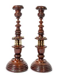A Pair of Continental Wooden Candlesticks