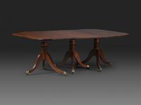 A Late Chippendale Flame Mahogany Triple Pedestal Dining Table