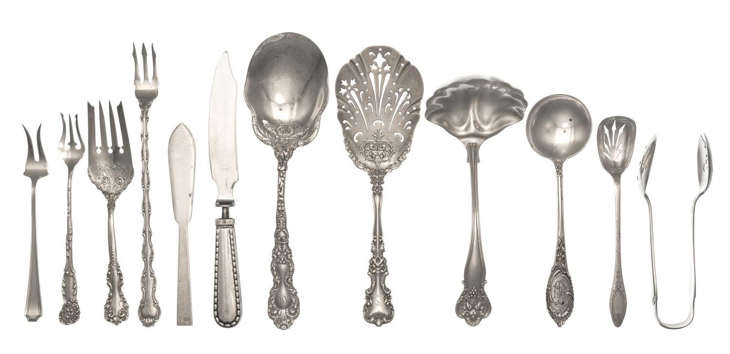 A Group of American Silver Flatware, Various Makers, comprising a sauce ladle, a flat pierced server, cocktail forks and others, togeth