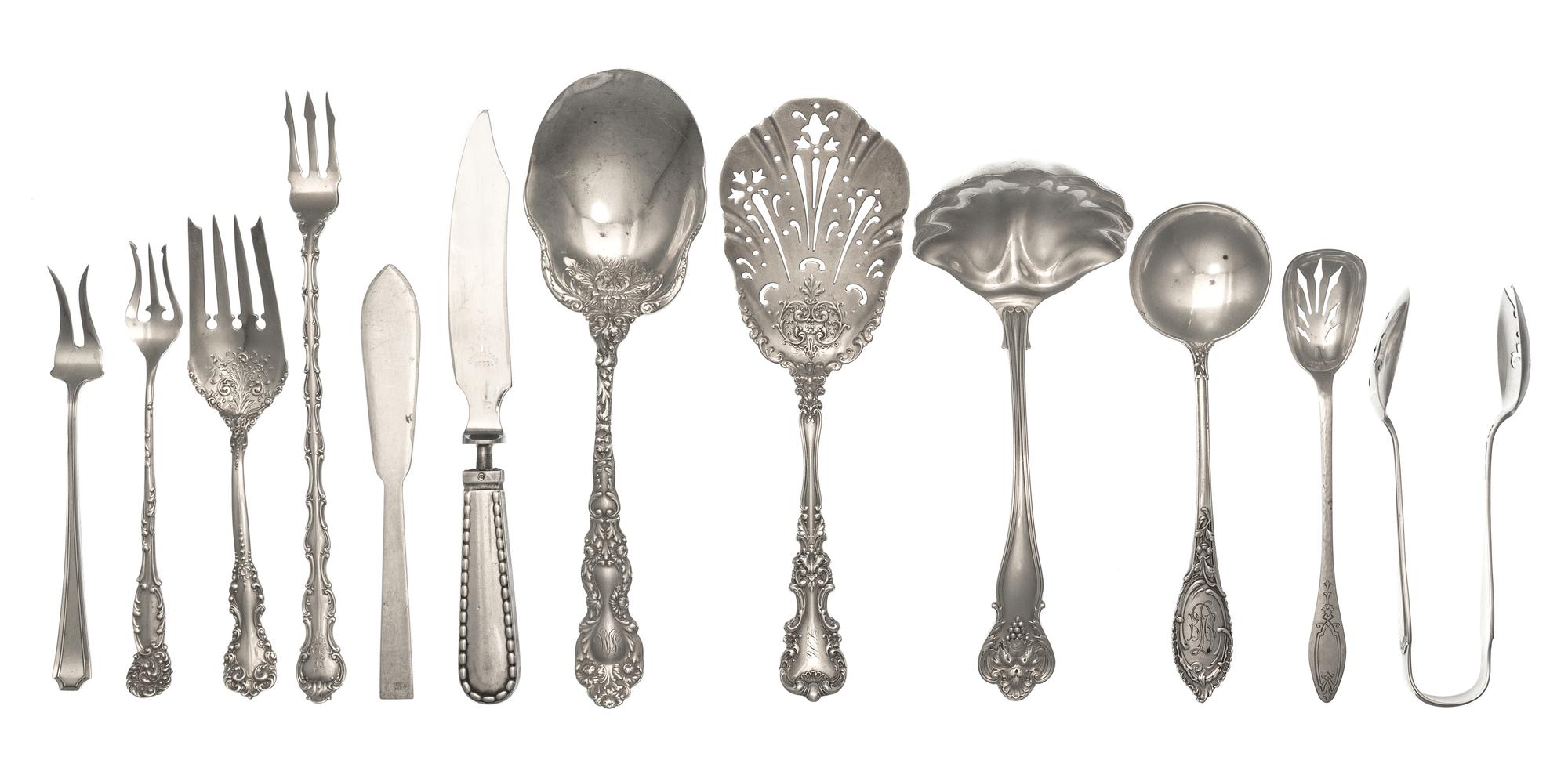 A Group of American Silver Flatware, Various Makers, comprising a sauce ladle, a flat pierced server, cocktail forks and others, togeth