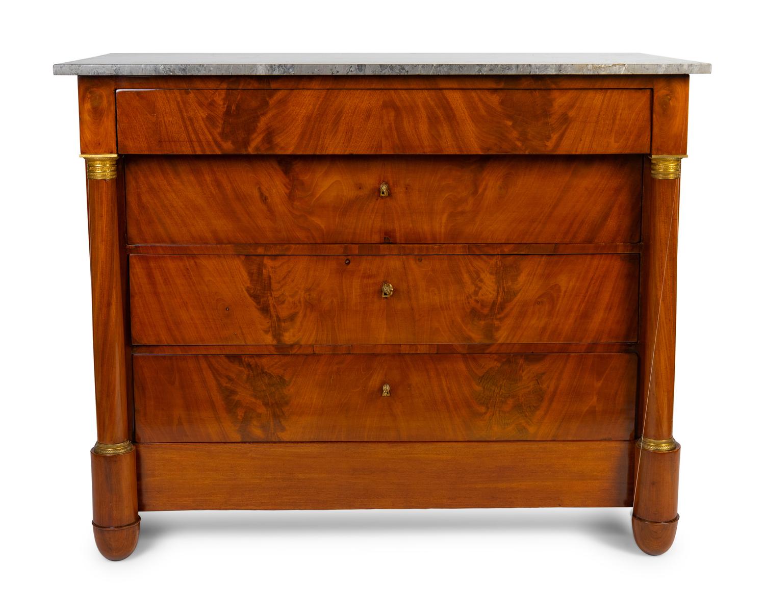 A Louis Philippe Style Gilt Bronze Mounted Mahogany Marble-Top Chest of Drawers