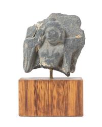 A Gandharan Gray Schist Stone Fragment Height 2 3/4 inches.