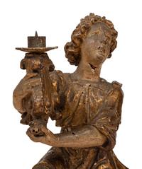 A Pair of Continental Giltwood Figural Altar Candlesticks