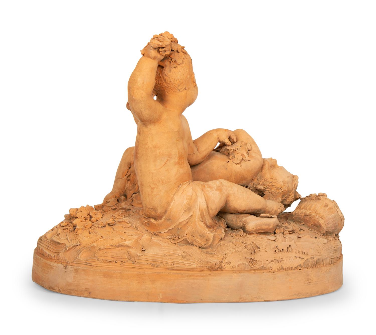 A Continental Terra Cotta Figural Group in the Style of Clodion — 20TH CENTURY