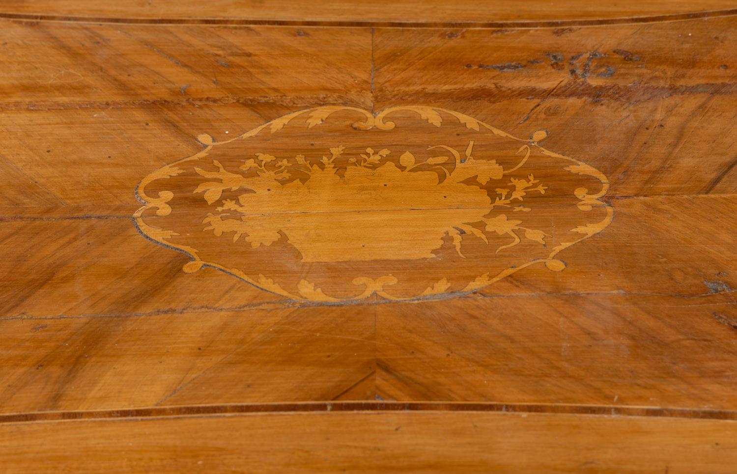 An Italian Walnut and Fruitwood Center Table