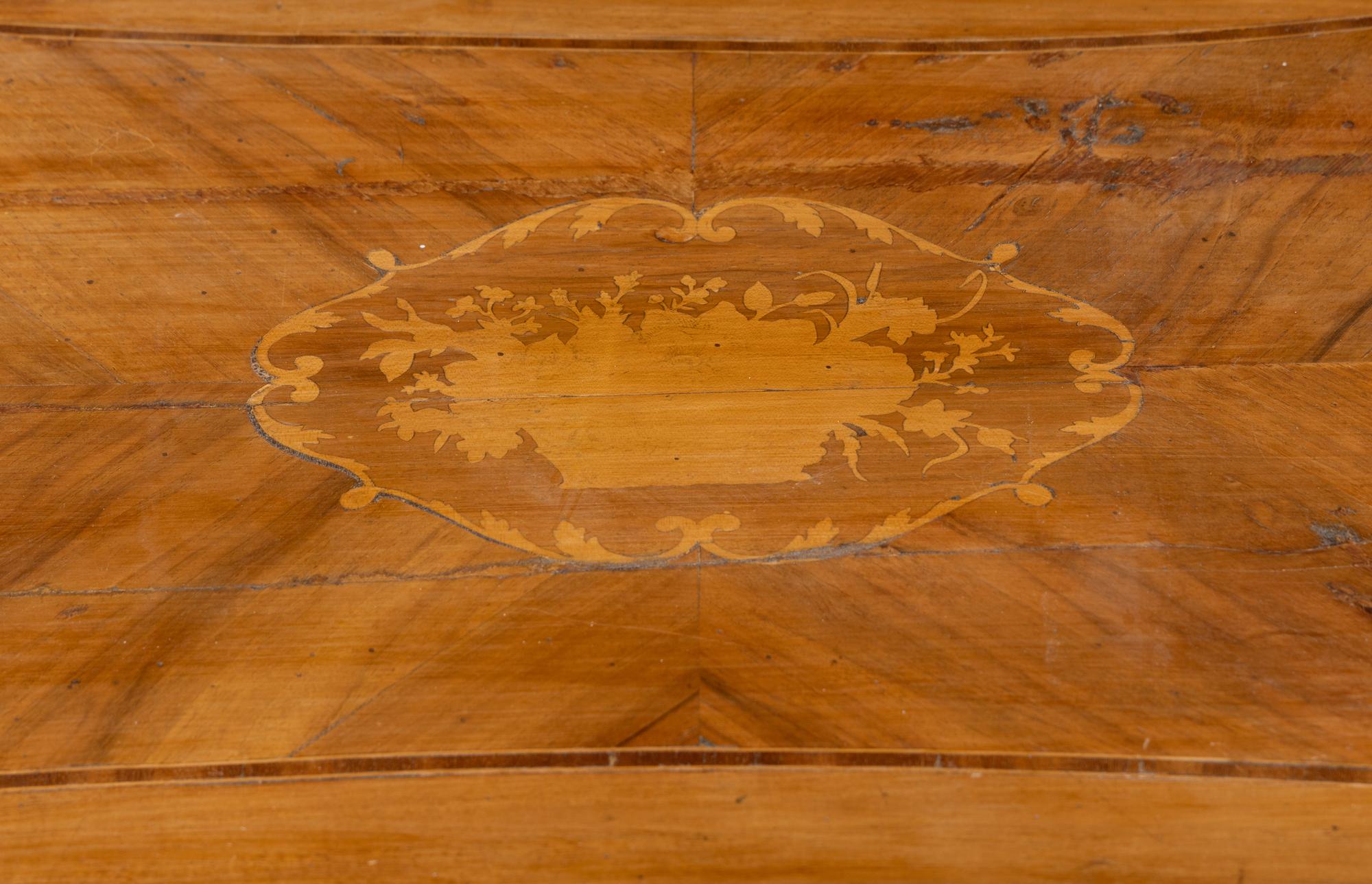An Italian Walnut and Fruitwood Center Table