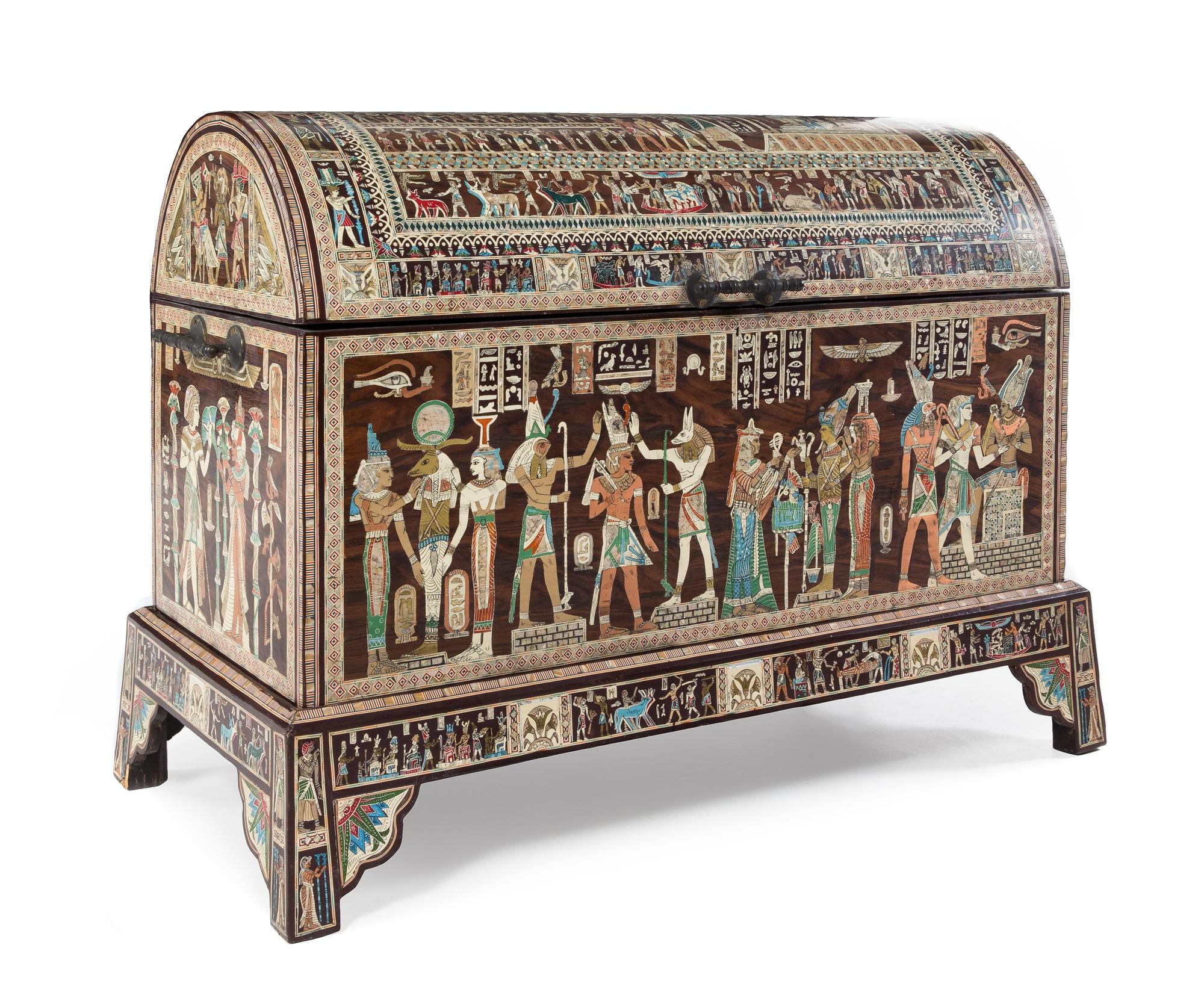 An Egyptian Revival Mother-of-Pearl Inlaid Trunk on Stand Height of chest 26 x width 44 1/2 x depth 20 1/4 inches. — 2OTH CENTURY